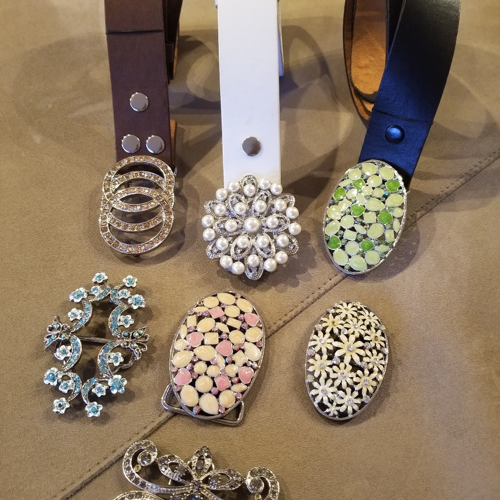 Vintage belts and interchangeable buckles. (This is sold)